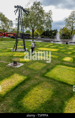 Marble Arch, London, UK. 26th Apr, 2019. A ghost town, marked only by yellow patches on the grass, with only one reamining camper. The site of the Extinction Rebellion Camp at Marble Arch. Credit: Guy Bell/Alamy Live News Stock Photo