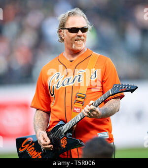 San Francisco, California, USA. 26th Apr, 2019. James Hetfield of Metallica plays the ''Star Spangled Banner'', before a MLB game between the New York Yankees and the San Francisco Giants at Oracle Park in San Francisco, California. Valerie Shoaps/CSM/Alamy Live News Stock Photo