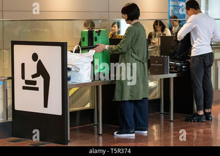 Tokyo, Japan. 27th Apr, 2019. Passengers wait for their flights at the departure lobby of Haneda Airport Terminal 2 in Tokyo. This year is expected to reach a record high of travelers to overseas and domestically destinations during an unusual 10-day Golden Week holiday due to the ascension to the throne of Crown Prince Naruhito and the start of the new Reiwa Era. The Golden Week holiday runs from April 27 to May 6. Credit: Rodrigo Reyes Marin/AFLO/Alamy Live News Stock Photo