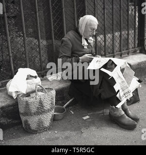 A woman wearing clogs sitting in a hammock, Stockholm, Sweden Stock ...