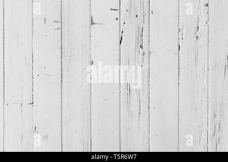 Weathered white painted wooden table from boards texture background Stock Photo