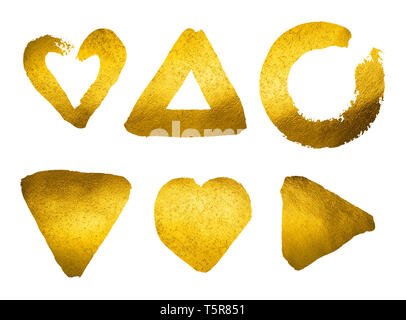 Gold paint stokes and different shapes isolated on white background Stock Photo