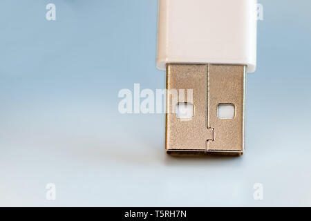 happy usb cable with face isolated on blue background Stock Photo