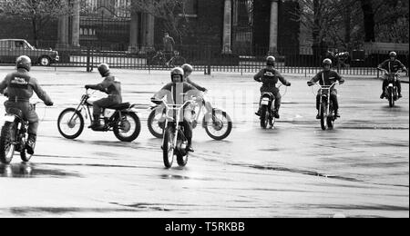 The Royal Artillery Motor Cycle Display Team performing tricks and stunts at Woolwich in 1972. Photo by Tony Henshaw Stock Photo