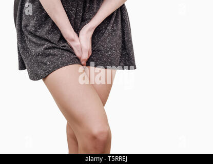 Pelvic thigh young woman with hands holding pressing her crotch of the  lower abdomen. Medical or gynecological health problems Stock Photo - Alamy