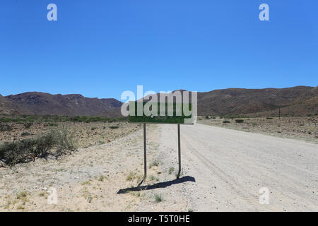 Road signs on a gravel road in Namibia Africa Stock Photo