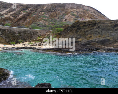 View on a bay lookout out of dark stone on Oahu, Hawaii Stock Photo