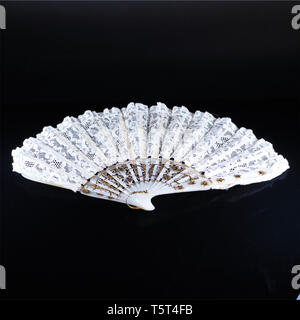 Photos of antique fans and hand held folding fans. Stock Photo