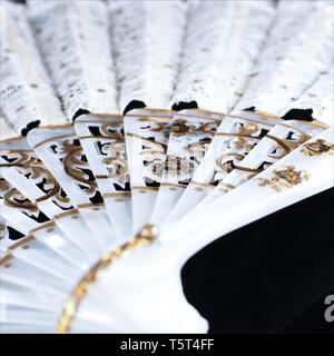 Photos of antique fans and hand held folding fans. Stock Photo