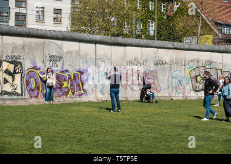 Berlin, Germany - April, 2019: People taking pictures at the  Berlin Wall Memorial  Berlin, Mitte Stock Photo