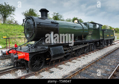 Cheltenham RC, ENGLAND - APRIL 24, 2019: Old restored Steam engine at the Gloucestershire Warwickshire Steam Railway  on track from Cheltenham RC Stock Photo