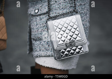 Paris, France - March 05, 2019: Street style outfit -  Woman wearing Chanel purse after a fashion show during Paris Fashion Week - PFWFW19 Stock Photo