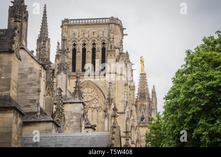 Side of the Cathedral Saint Andre with the statue of the Virgin Mary in Bordeaux Stock Photo