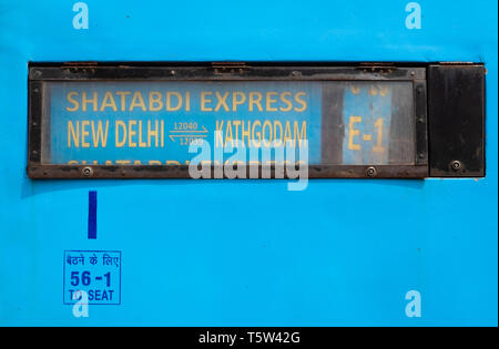 Destination sign on the first class carriage of an Indian Railways train from New Delhi to Kathgodam in Uttarakhand Northern India Stock Photo