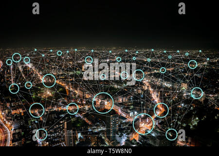 Network connection with neon light circle and Empty inside for any corporate logos or icon., in high building background at night. Stock Photo