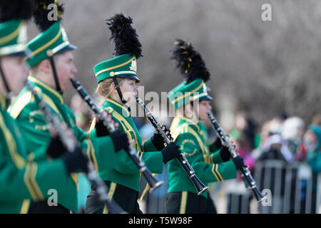 Chicago, Illinois, USA - March 16, 2019: St. Patrick's Day Parade, The St. Vincent - St. Mary Fighting Irish Marching Band going down Columbus drive a Stock Photo