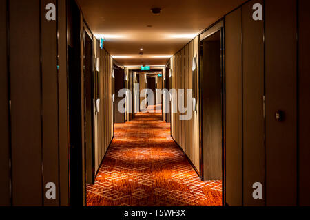 Long dark corridor in a luxury hotel Stock Photo