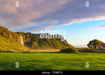 Seljalandsfoss Waterfall, a major tourist attraction,  located on the southern coast of Iceland. Stock Photo