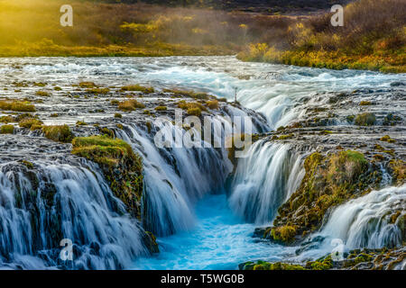 The beautiful Icelandic waterfall Bruarfoss is fed by glacier waters which give it the Turquoise color. Stock Photo