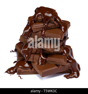 dark or milk chocolate pieces stack and chocolate syrup isolated on white Stock Photo
