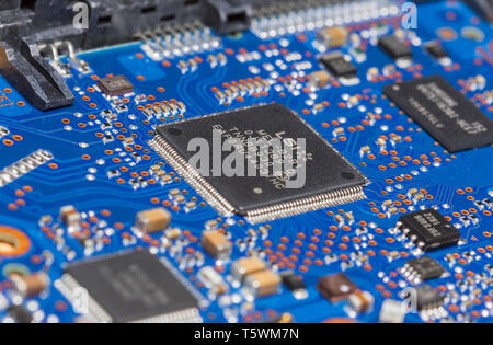 Macro of Integrated circuits and other surface mount (SMT) components mounted on a PCB (Printed Circuit Board).
