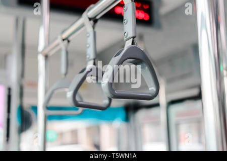 Bus Hand Ring Handrail on a bus door Stock Photo - Alamy