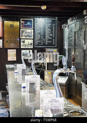 Madrid, Spain - April 11, 2019. The bar counter of a Spanish tavern of Madrid downtown with a Wine List price in the background. Spain. Stock Photo