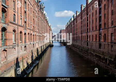 Speicherstadt in Hamburg, Germany. It is the largest warehouse district in the world where the buildings stand on timber-pile foundations. Stock Photo
