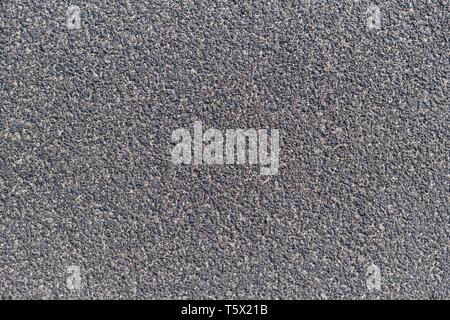 Stadium outdoor grey black running texture, soft rubber surface. Stock Photo