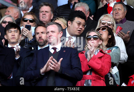 England Manager Gareth Southgate (centre left) in the stands during the Premier League match at St Mary's Stadium, Southampton. Stock Photo