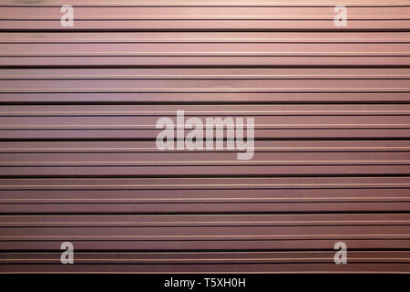 burgundy shop shutter, Beautiful color, steel texture. Stock Photo