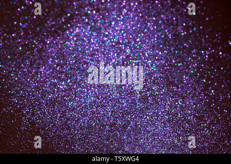 Blue and purple blurred sparkling glittering background. Festive backdrop. Stock Photo