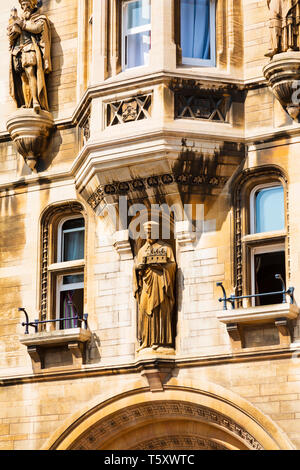 Ornate decoration above the door, Gonville and Caius College, Trinity Street, University town of Cambridge, Cambridgeshire, England Stock Photo