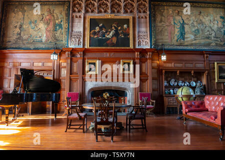 The Cross Hall, part of the State Rooms, at Bamburgh Castle, Northumberland, England, UK Stock Photo