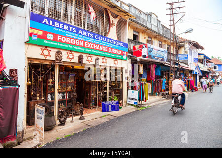 COCHIN, INDIA - MARCH 14, 2012: Market street with souvenir and spice shops in Fort Kochi in Cochin city, India Stock Photo