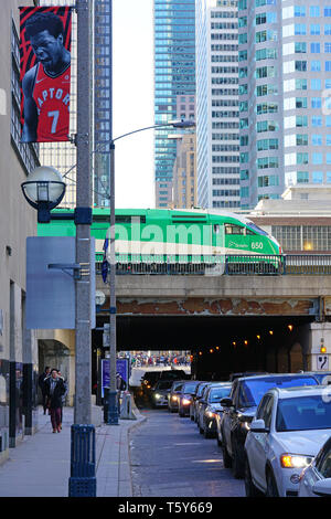 TORONTO, CANADA -26 MAR 2019- View of green and white GO transit commuter trains at the Union Station in downtown Toronto, Ontario, Canada. Stock Photo