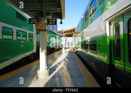 TORONTO, CANADA -26 MAR 2019- View of green and white GO transit commuter trains at the Union Station in downtown Toronto, Ontario, Canada. Stock Photo