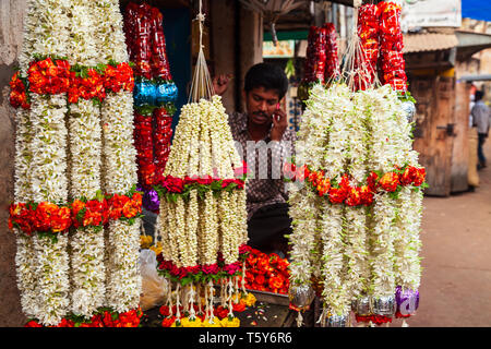 MYSORE, INDIA - MARCH 26, 2012: Flower offerings at the local market in India Stock Photo