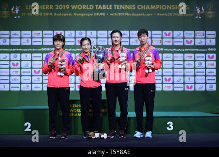 Budapest, Ding Ning and Wang Manyu of China pose for photo during the awarding ceremony of the women's singles match of 2019 ITTF World Table Tennis Championships in Budapest. 27th Apr, 2019. (From L to R)Silver medalist Chen Meng, gold medalist Liu Shiwen, bronze medalists Ding Ning and Wang Manyu of China pose for photo during the awarding ceremony of the women's singles match of 2019 ITTF World Table Tennis Championships in Budapest, Hungary on April 27, 2019. Credit: Lu Yang/Xinhua/Alamy Live News Stock Photo