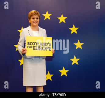 Edinburgh, Scotland, UK. 27 April, 2019. SNP ( Scottish National Party) Spring Conference takes place at the EICC ( Edinburgh International Conference Centre) in Edinburgh. Pictured; First Minister Nicola Sturgeon poses in front of European Union emblem Credit: Iain Masterton/Alamy Live News Stock Photo