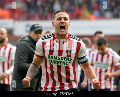 Sheffield, England 27th April. Sheffield United's captain BIlly Sharp celebrate their win and promotion to the premiership at the end of their FA Championship football match between Sheffield United FC and Ipswich Town FC at the Sheffield United Football ground, Bramall Lane, on April 27th Sheffield, England. Stock Photo