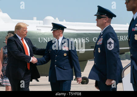President Donald J. Trump shakes hands with United States Air Force personnel escorting him from Marine One to Air Force One at Joint Base Andrews, Md. Wednesday, April 24, 2019, prior to the departure to Atlanta, Ga  People:  President Donald Trump Stock Photo