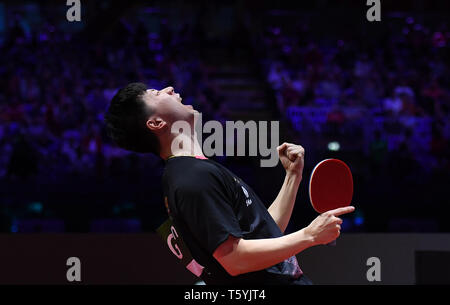 Budapest. 27th Apr, 2019. Ma Long of China celebrates after the men's singles semifinal with his teammate Liang Jingkun at 2019 ITTF World Table Tennis Championships in Budapest, Hungary on April 27, 2019. Credit: Tao Xiyi/Xinhua/Alamy Live News Stock Photo