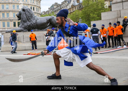 A member of Gatka - The Sikh Martial Art seen performing martial arts at Trafalgar Square during the festival. The Vaisakhi Festival is a religious festival that marks the Sikh New Year. This year's celebrations took place on 14 April which commemorates the beginning of Sikhism as a collective faith and London's celebrations are an opportunity for people from all communities, faiths and backgrounds to experience a festival that is celebrated by Sikhs who live in the capital and over 20 million people across the world. Stock Photo