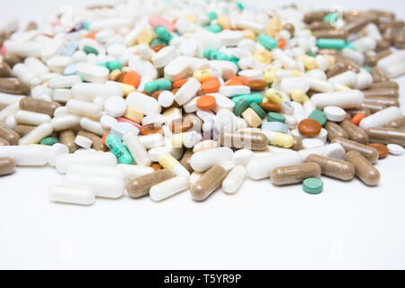 A large amount of drugs - medication in pills, capsules and tablet form Stock Photo