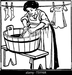 A woman washing clothes on washboard and clothes hanging on rope in background, vintage line drawing or engraving illustration Stock Vector