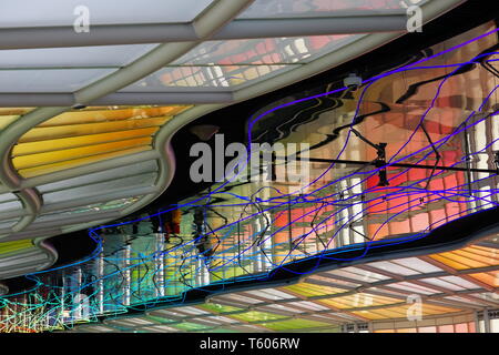 CHICAGO, IL -25 APR 2019- View of the colored electric neon tunnel The Sky Is the Limit at Chicago O'Hare International Airport (ORD) connecting the B Stock Photo