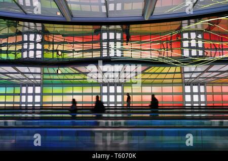 CHICAGO, IL -25 APR 2019- View of the colored electric neon tunnel The Sky Is the Limit at Chicago O'Hare International Airport (ORD) connecting the B Stock Photo