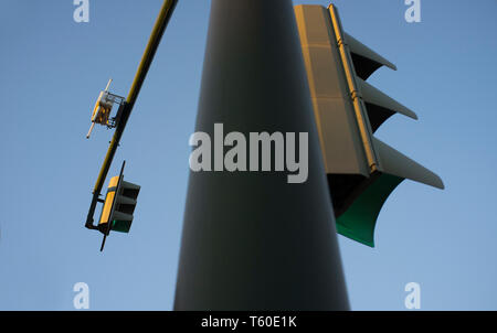 Wireless device for managing traffic lights. Box attached to pole Stock Photo