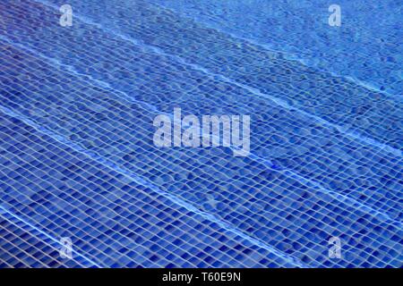 Blue Mosaic Tiled Swimming Pool Steps Seen Through Water - Image Stock Photo